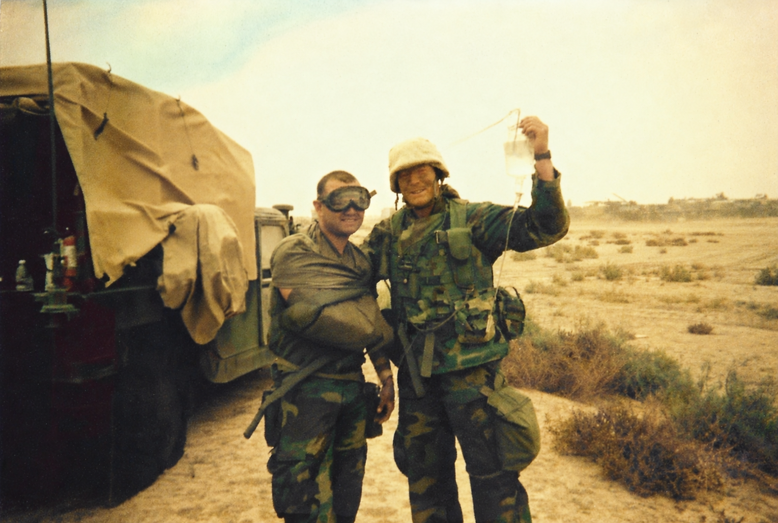 Jerry Adams with a Marine patient outside Baghdad, Iraq